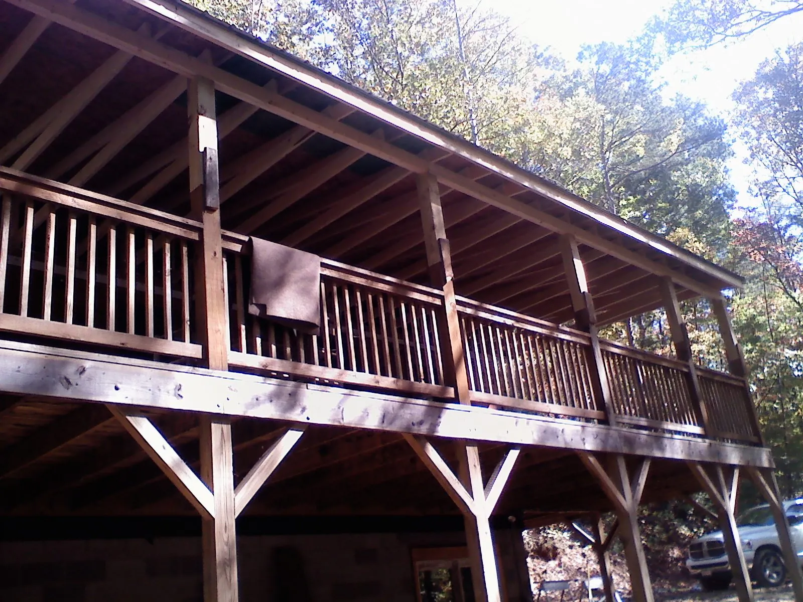Timber framing under a new elevated porch and deck — Roof Leak Repair in Minoa by Roofing Brothers
